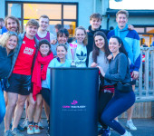 Group with rugby trophy