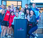 Group with rugby trophy